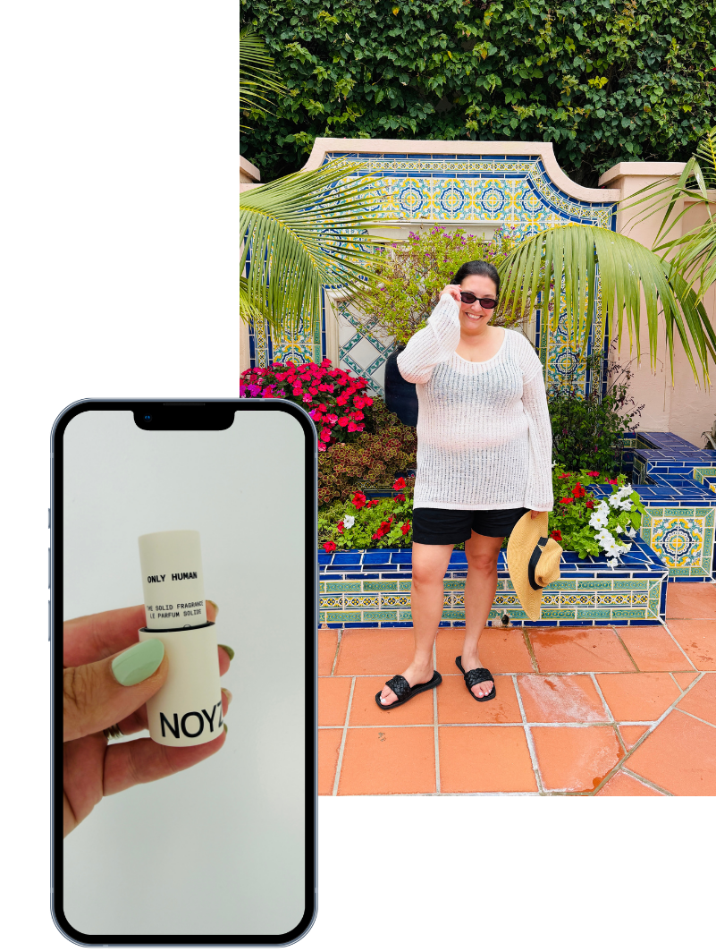 photo of woman in crochet top and black shorts holding hat in front of colorful flowers, with a photo of an iphone with a hand holding a lipstick.